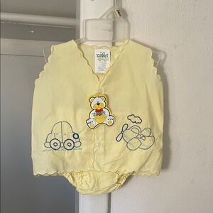 Charming Yellow Baby Vest with Embroidered Motifs